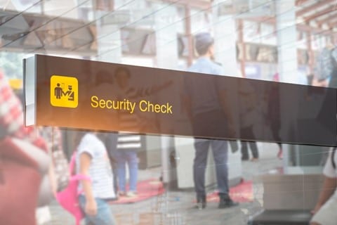 A sign indicating a security check