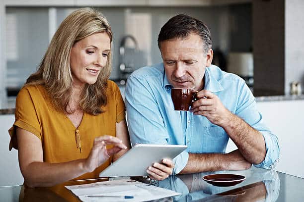 Shot of a mature couple Buying CPAP Distilled Water Online