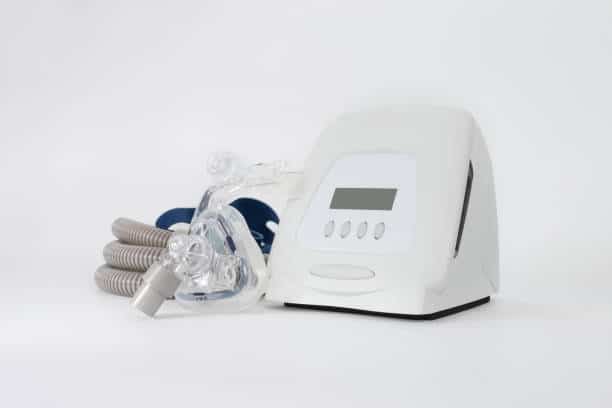 A picture of a CPAP machine and CPAP mask 