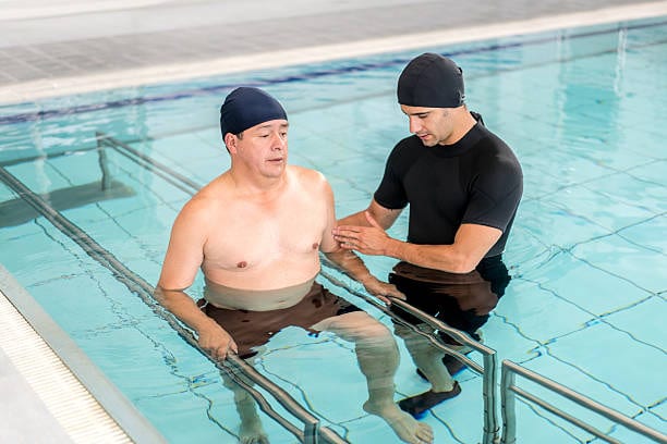 A picture of a man having hydrotherapy